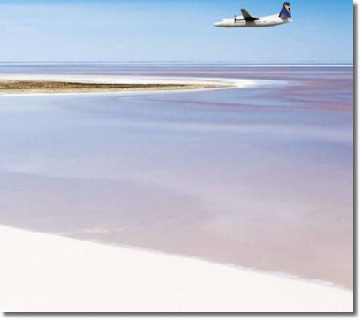 Australian Air Holidays Fokker aircraft flying over Lake Eyre